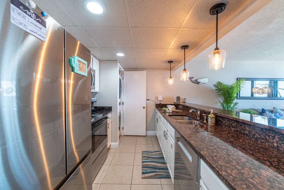 Fully renovated kitchen with stackable washer/dryer