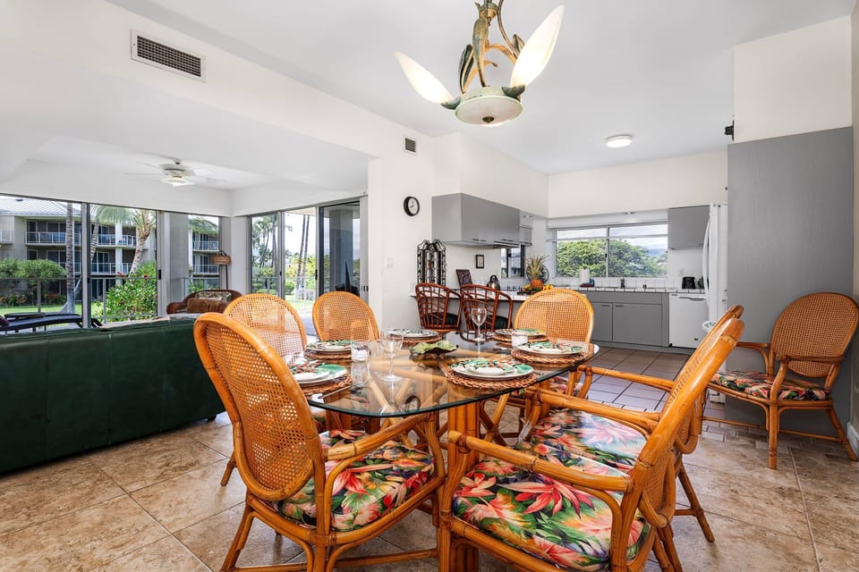 Open Living Spaces Flow from Dining Room to Living Room to Kitchen