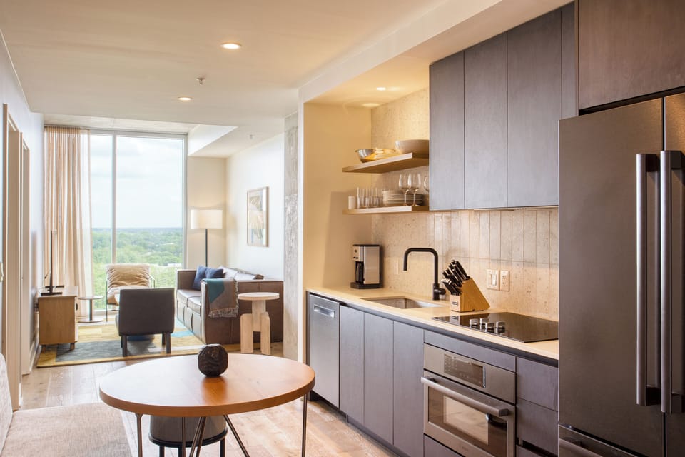 Living area flows into the kitchen creating a calming atmosphere. (Scoot)