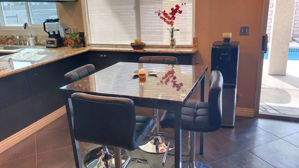 Breakfast table, Mountain Valley Spring water in glass available through cooler for extra charge per 5 gallons.