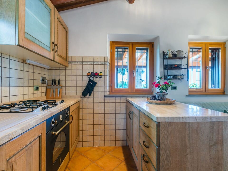 Kitchen, Countertop, Interior Design, Wood, Cabinetry, Flooring, Kitchen Appliance, Kitchen Sink, Ceiling, Major Appliance