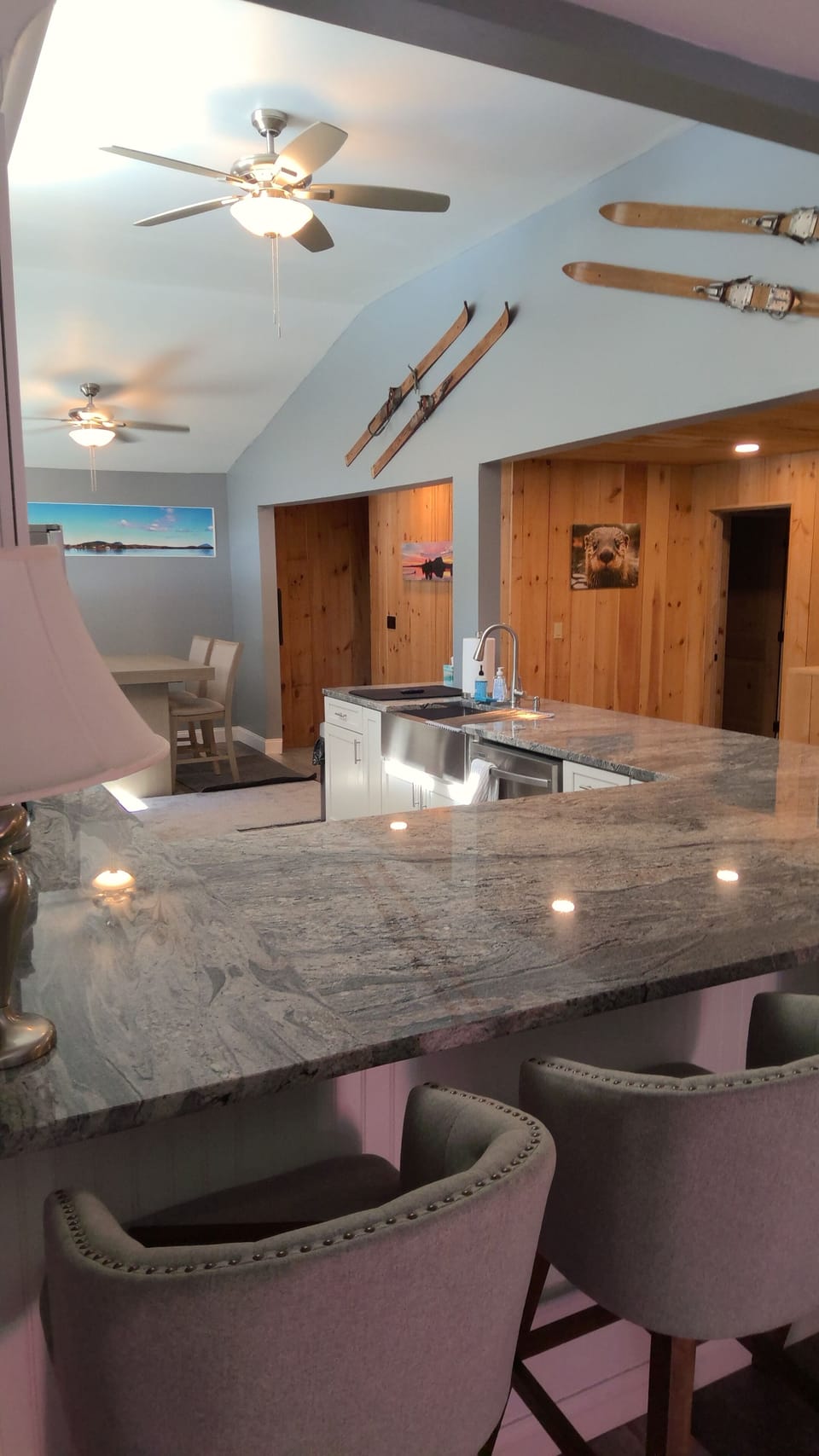 The upstairs kitchen with beautiful granite countertops
