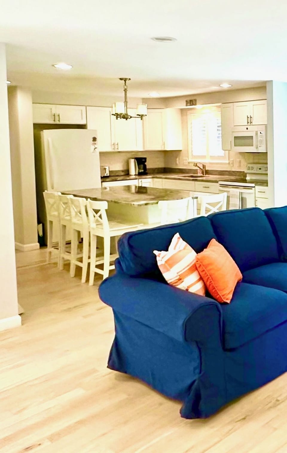 Gather around the new marble top island—roomy seating for six