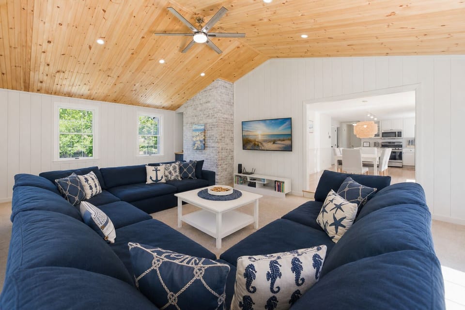 Cozy up on the oversized sectional with Smart TV and board games. 