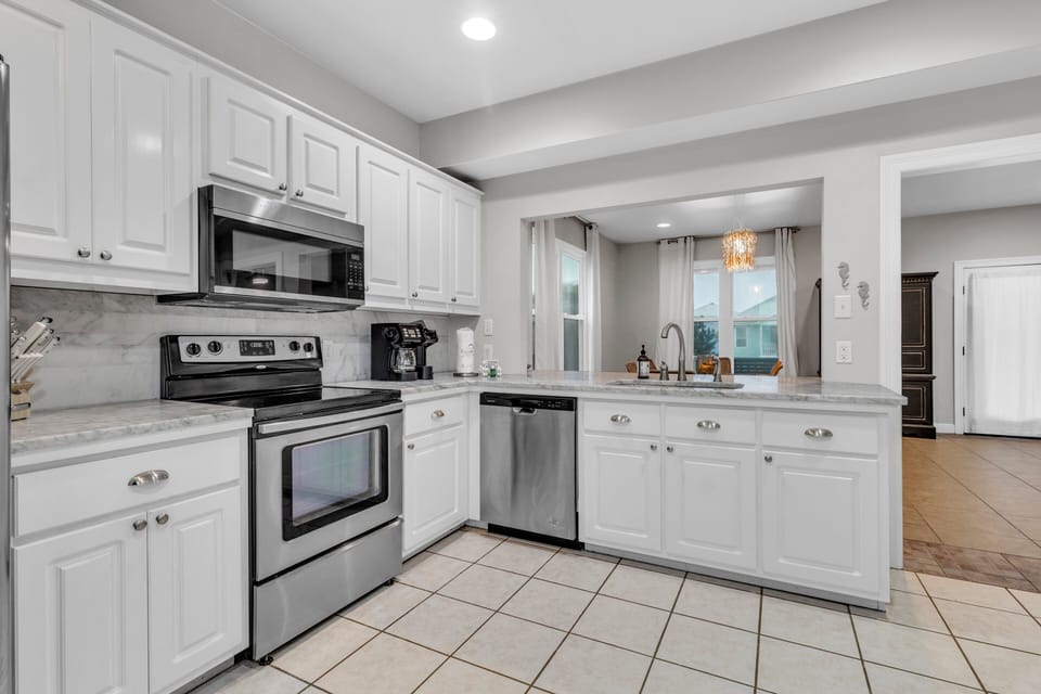 Beach Revival. Ft. Morgan, AL. Beach House. 3BR 2.5BA. Sleeps 12. Managed by Island Rentals.