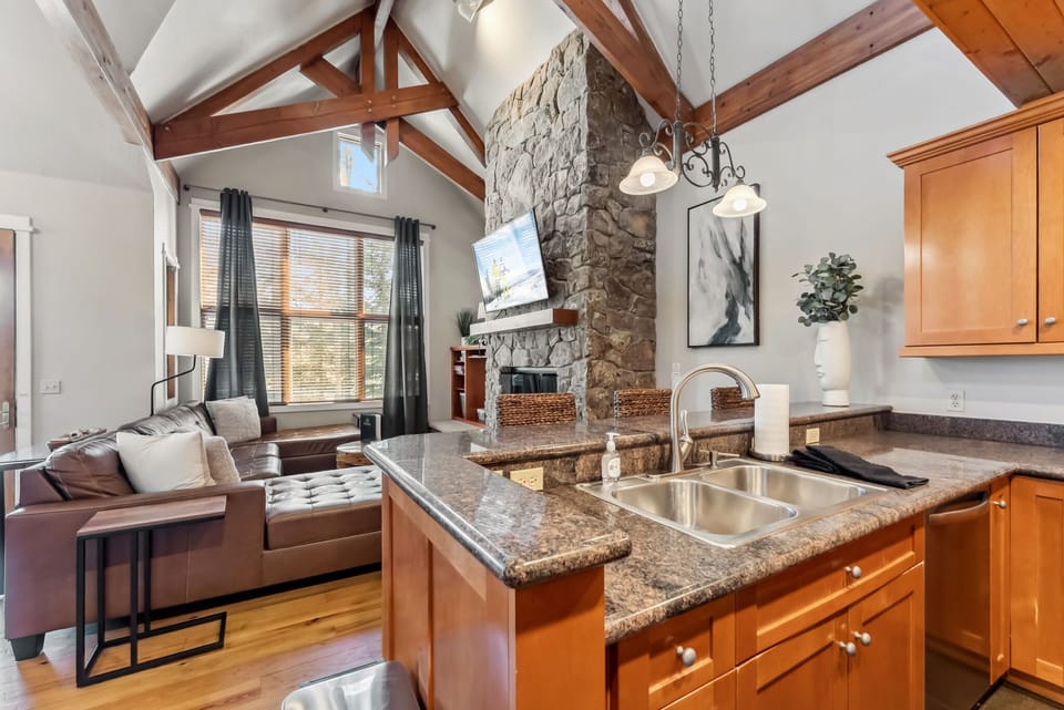 Kitchen: Main floor, drip coffee maker, Keurig, toaster, cooking utensils, tableware