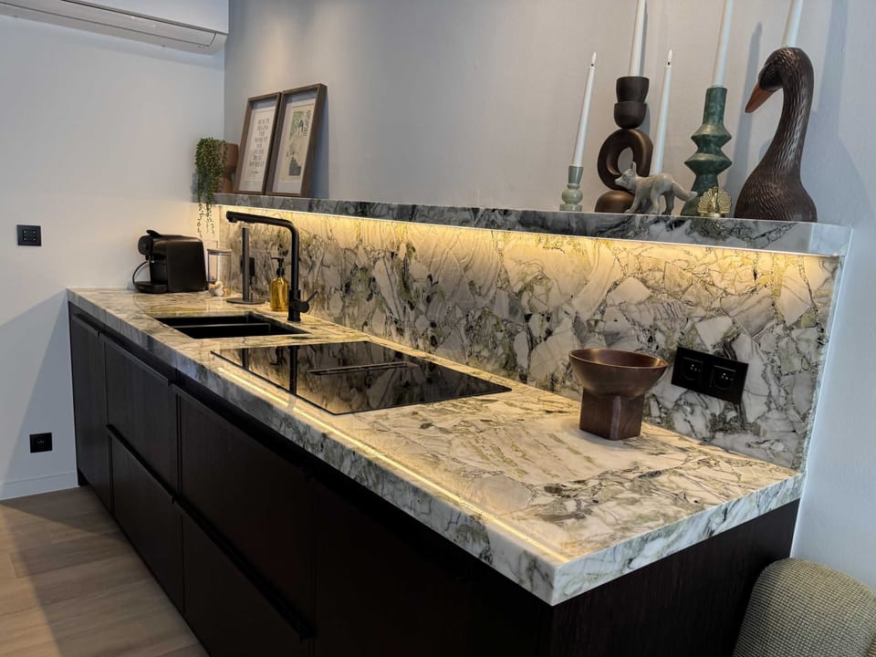 Sleek marble countertop with artistic details.