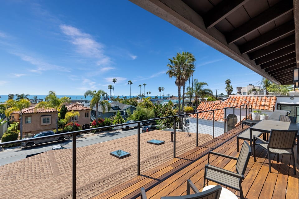 Panoramic Ocean View 280 square foot deck off main living area of Sunset House.