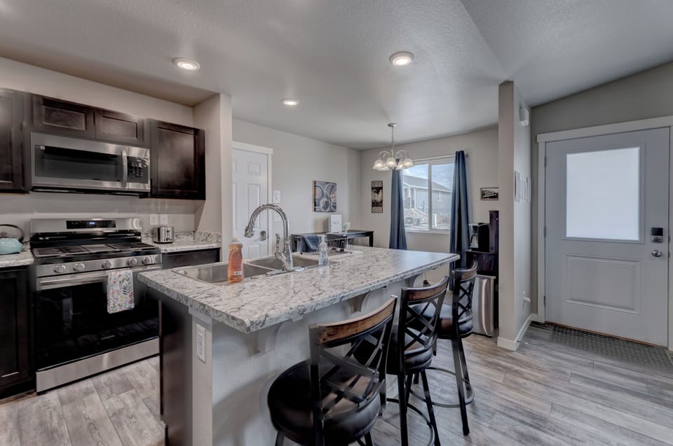 Kitchen with full complement of cookware, bakeware, and utensils