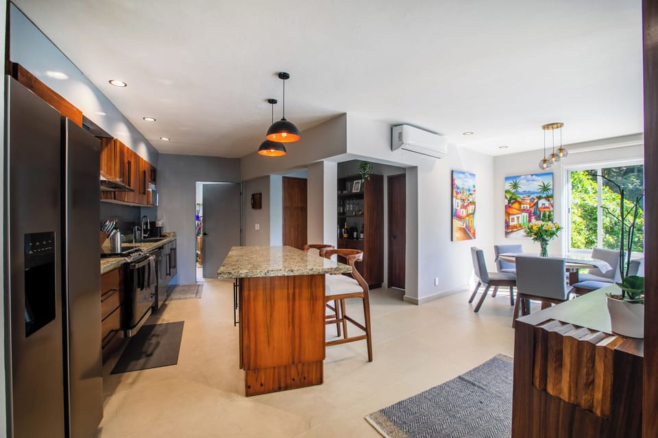 Spacious open-concept kitchen, dining, and living area