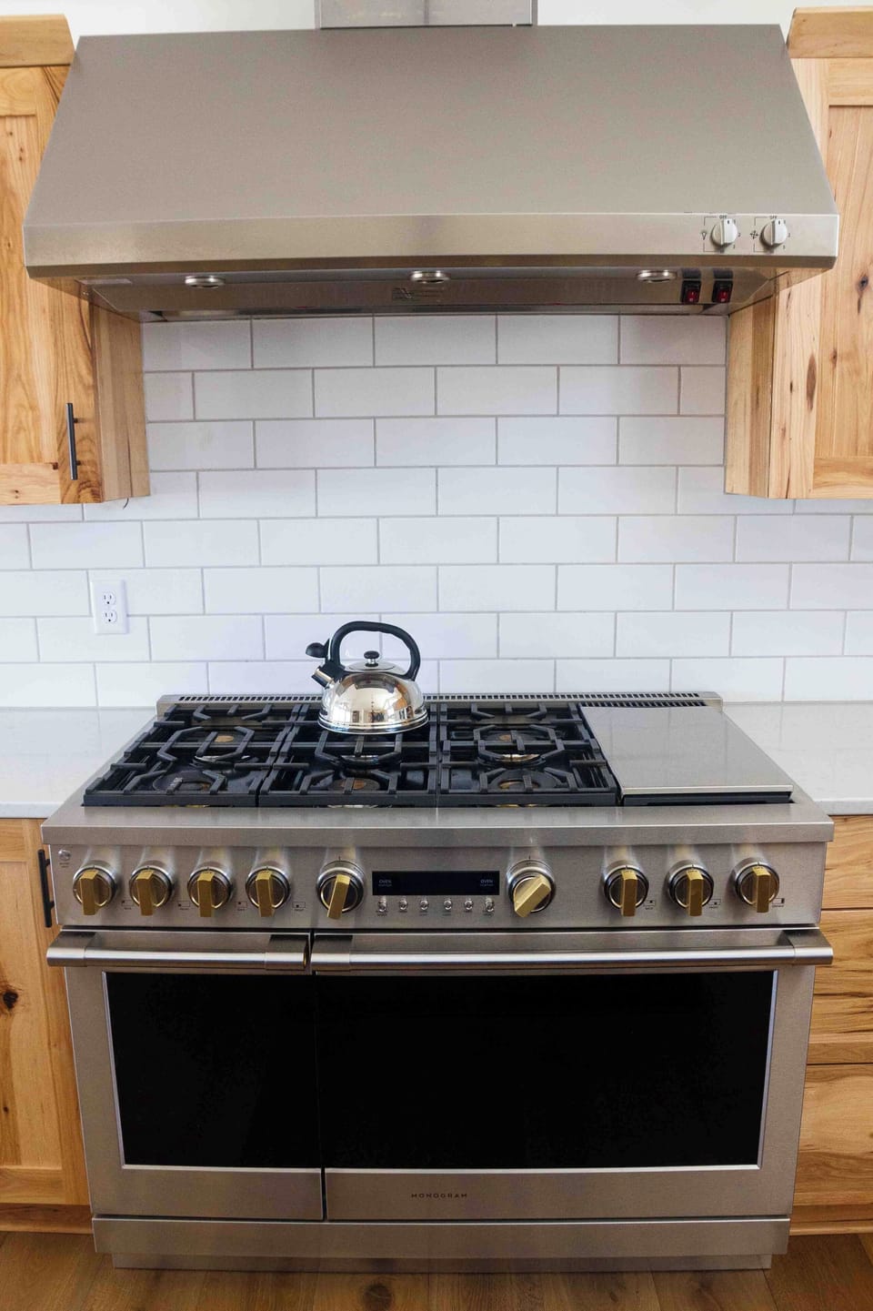 48" GE Monogram stove with double oven
