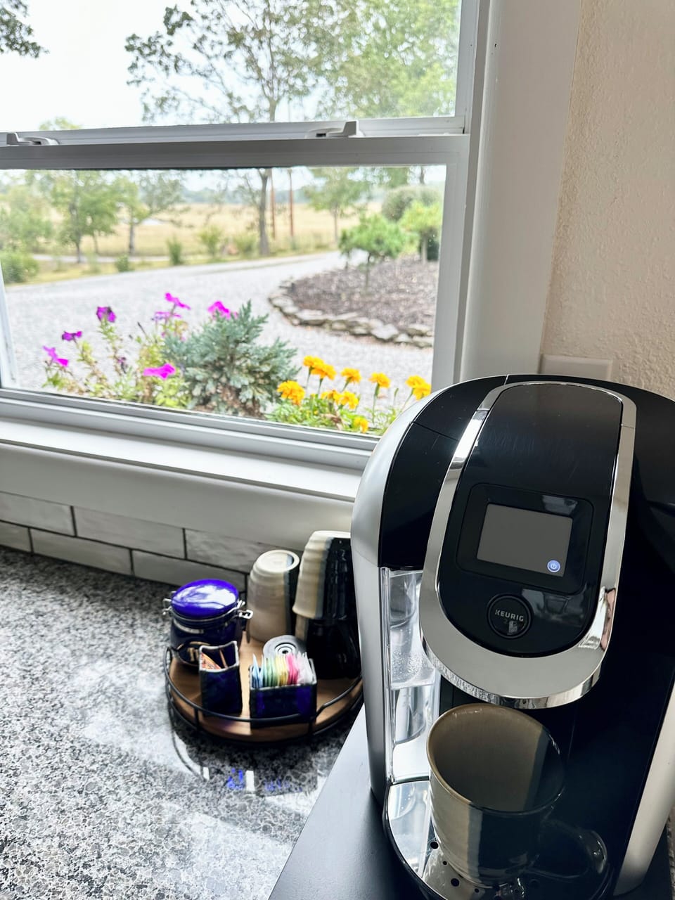 Keurig, coffee pods, creamers, varied sweeteners, and teas available