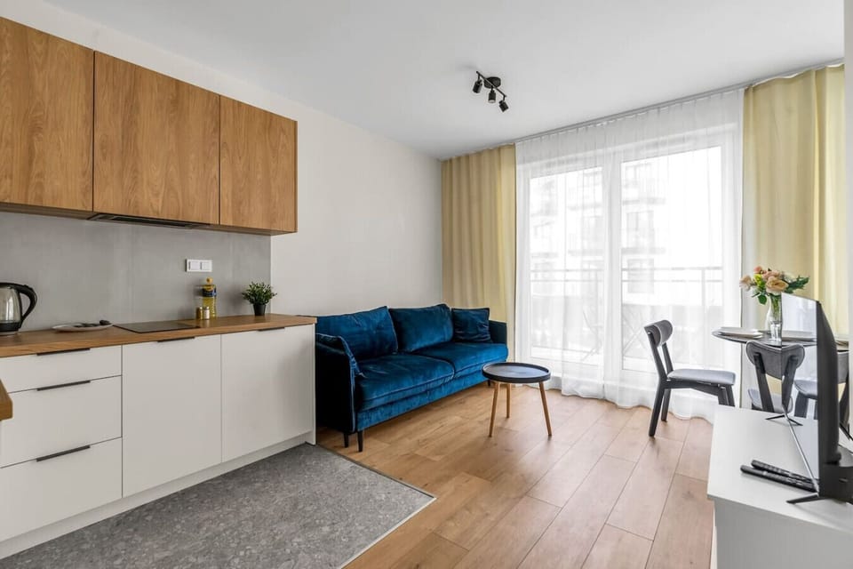 Living Room with Sofa Bed and Smart TV | Book Now with RENTUJEMY.COM