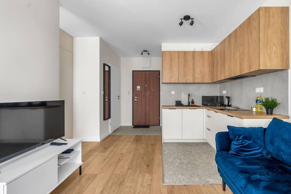 Living Room with Sofa Bed and Smart TV | Book Now with RENTUJEMY.COM