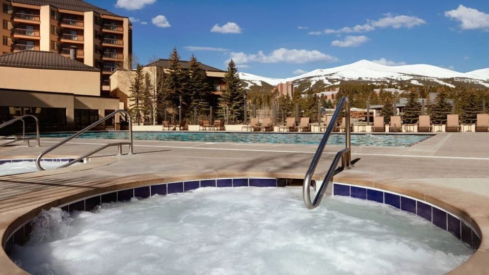 Hot tub and outdoor heated pool