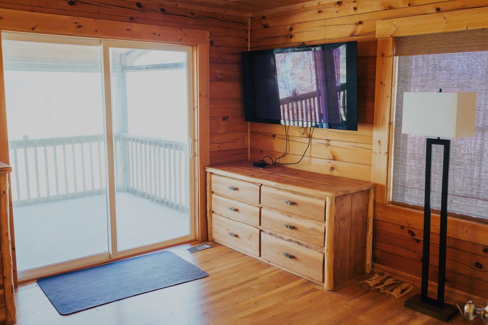 Master bedroom with access to screen porch