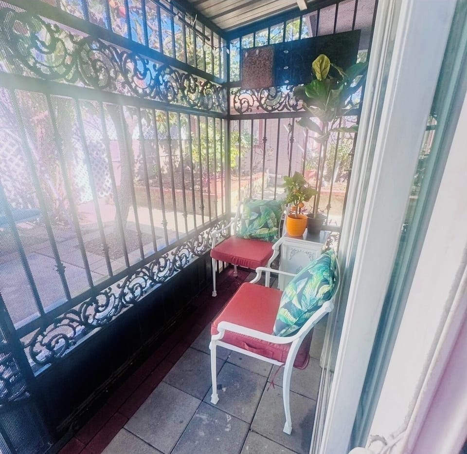 I call this the birdcage. Private peaceful sitting area attached to your space.