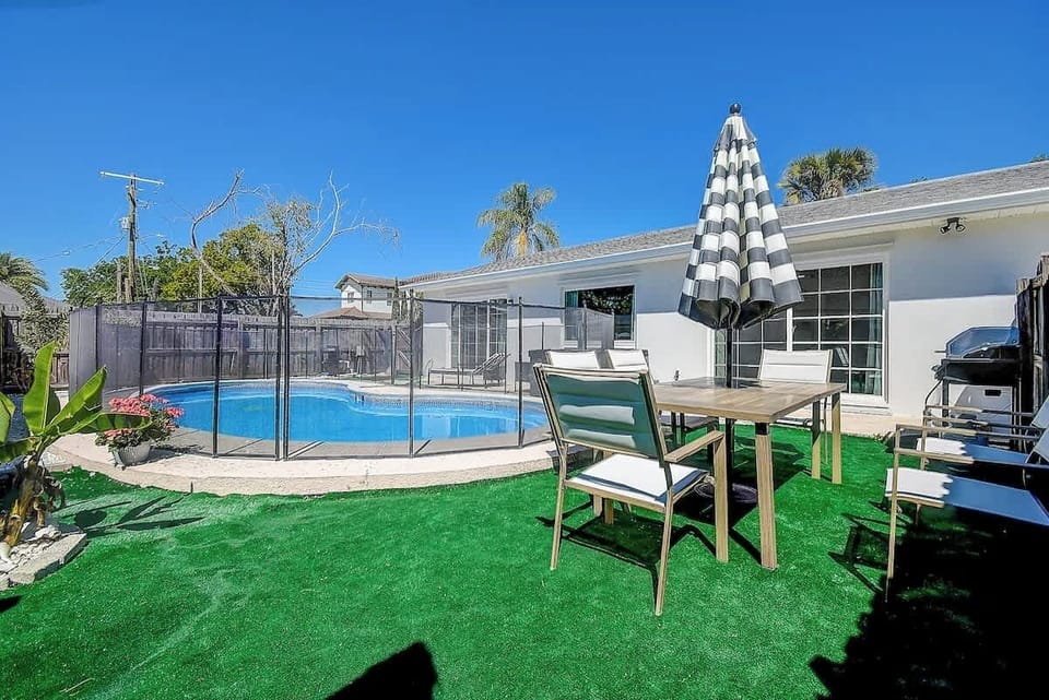 Soak up the sun and make a splash!  This backyard oasis is the perfect escape for poolside relaxation, BBQ nights, and endless good vibes  #PoolsideParadise 