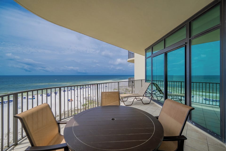 Relax on your balcony, taking in the soothing sights and sounds of the coast while sipping a refreshing drink