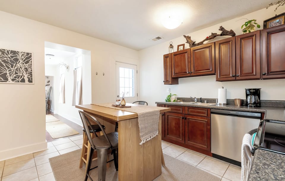 Gather at the kitchen island for coffee and conversation.
