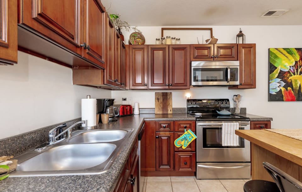 Cleanup is easy with the included dishwasher and double sink.