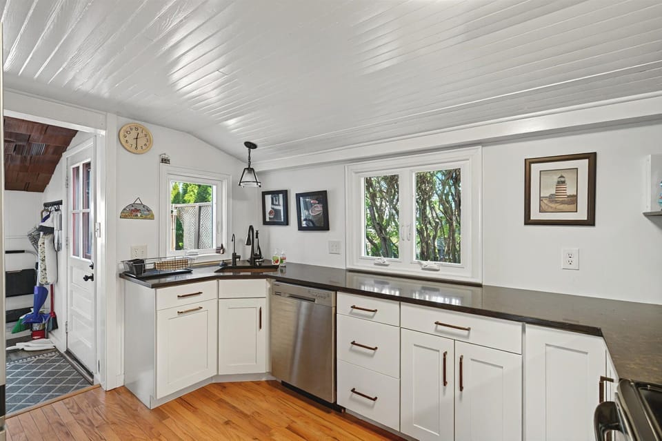 Fully equipped kitchen with ample counter space, ready for preparing group meals.