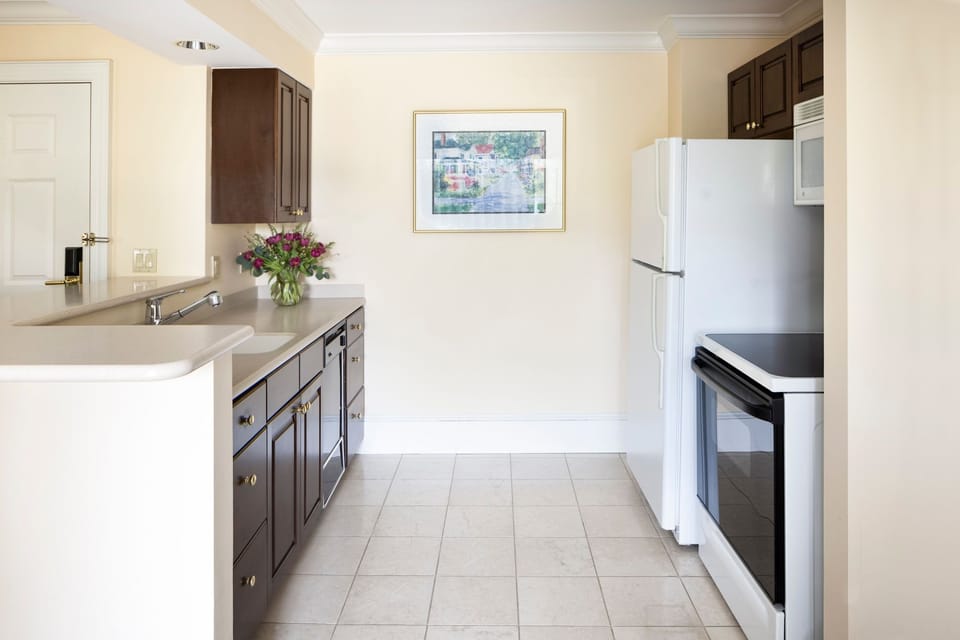 A fully equipped kitchen with modern finishes offers the perfect blend of convenience and style.