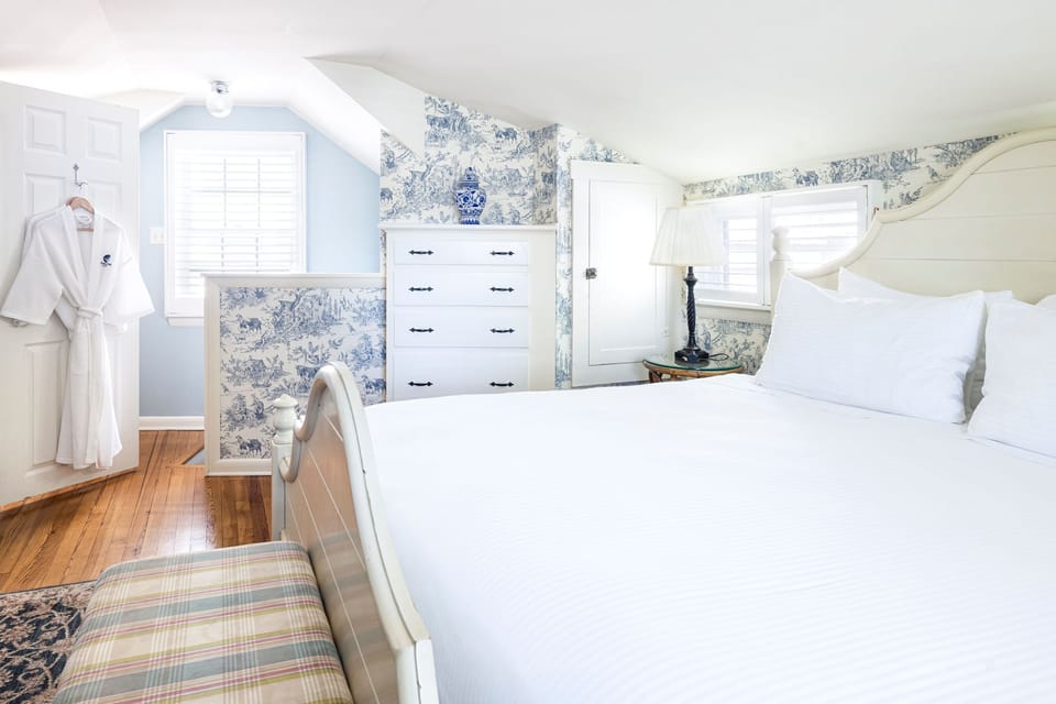 Soft tones and elegant touches create a cozy bedroom designed for ultimate comfort.