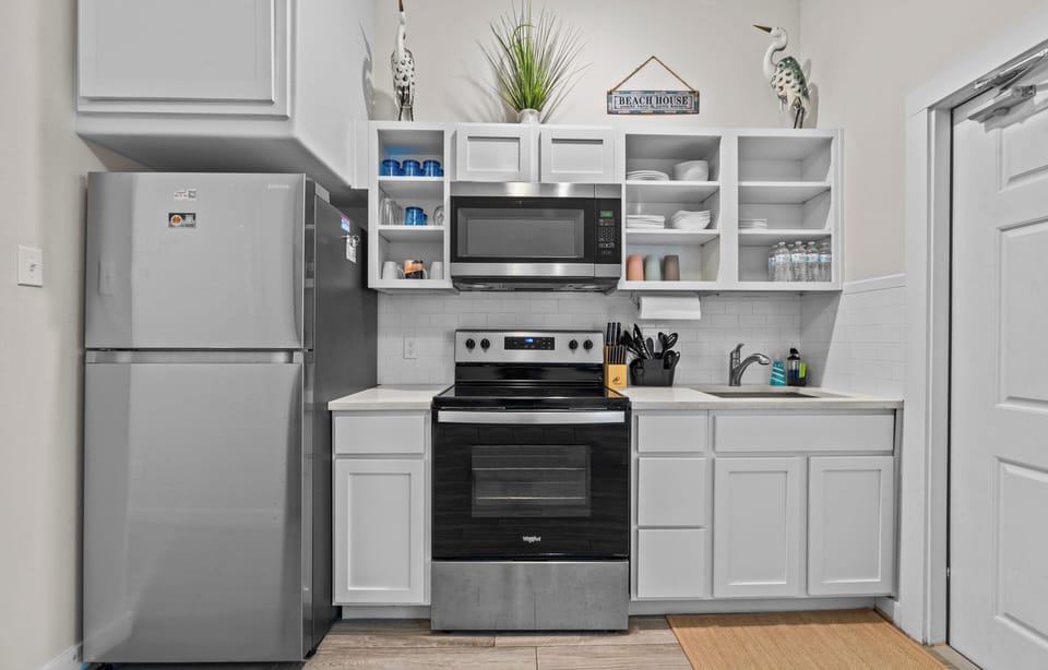 Refrigerator with Freezer, Stovetop/Oven, Microwave and large sink with disposal