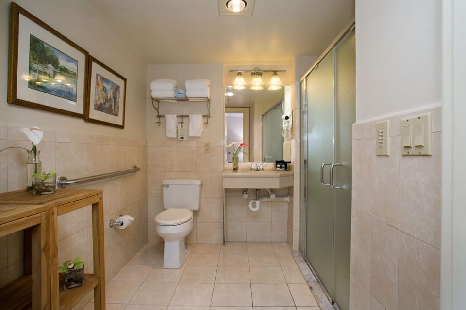 A spacious and well-appointed bathroom with elegant finishes for a refreshing experience.