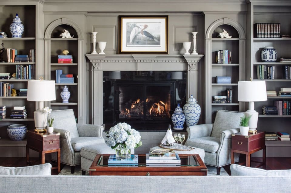 Cozy up by the fire in this inviting library lounge, where timeless charm meets modern comfort.