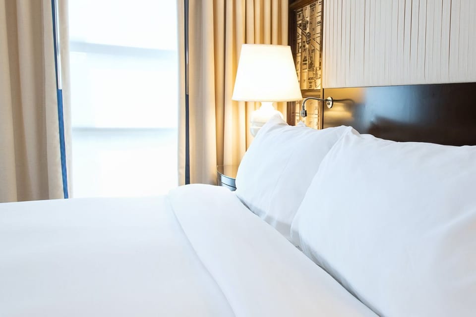 Cozy and inviting, with crisp linens and warm accents designed for ultimate relaxation.