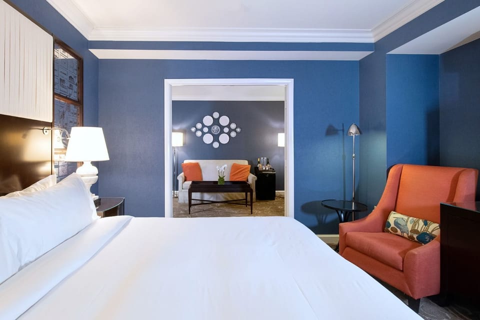 A cozy yet sophisticated escape, featuring warm lighting, plush seating, and inviting décor.