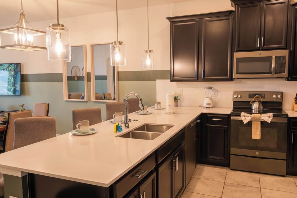 Cook with ease in a stylish kitchen — perfect for long stays and family vacations near Disney