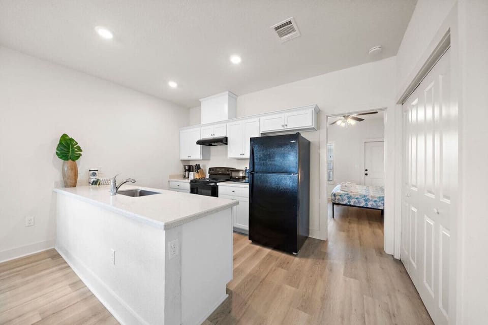 Find joy in the simplicity of this chic and well-organized culinary space