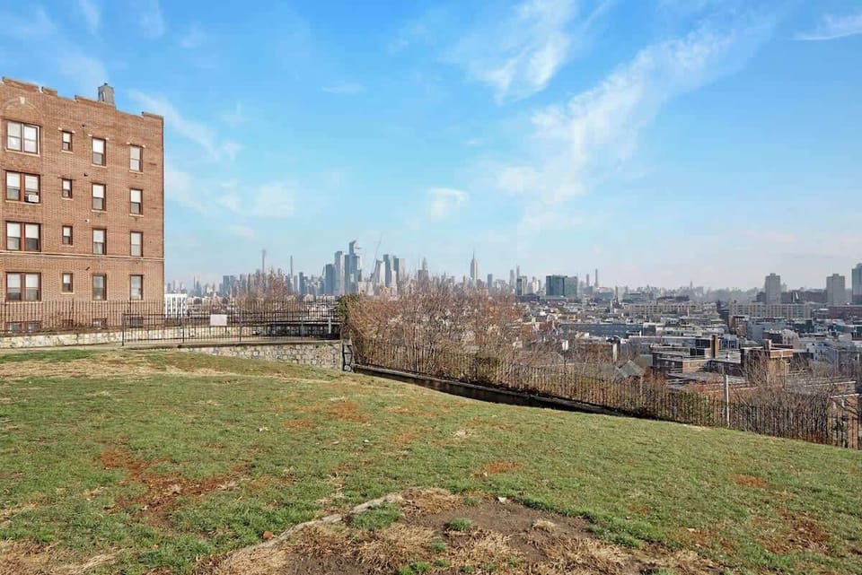Enjoy a picturesque view of downtown Jersey City, where the mix of urban life and natural beauty creates the perfect backdrop.

