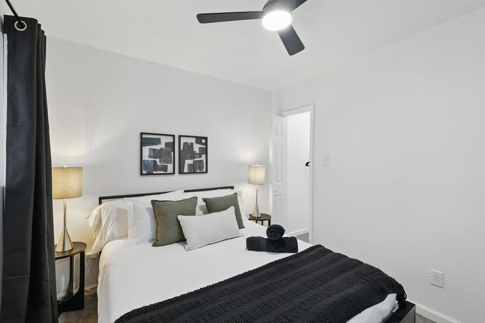 “Peaceful Queen Bedroom Retreat”
Rest easy in this calming queen bedroom, featuring soft lighting, blackout curtains, and a sleek modern design — perfect for a good night’s sleep.