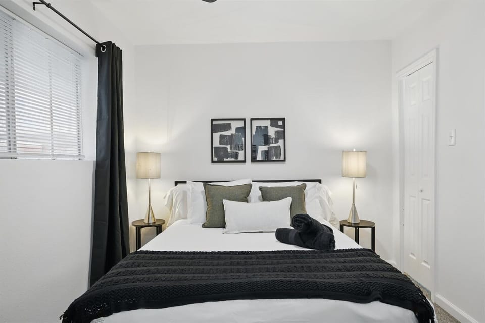 “Peaceful Queen Bedroom Retreat”
Rest easy in this calming queen bedroom, featuring soft lighting, blackout curtains, and a sleek modern design — perfect for a good night’s sleep.