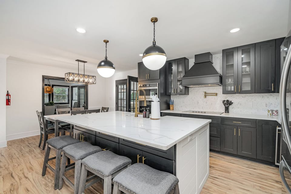 The large gourmet kitchen will hold your entire group and be the perfect place to hang out and cook delicious meals. It is equipped with stainless steel appliances, a large island and all of the tools necessary to cook with