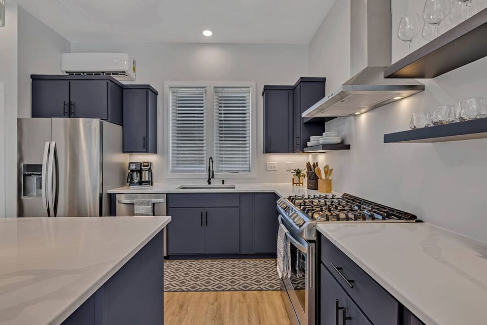 Fully loaded full size kitchen, variety of cooking appliances, bar seating, cleaning supplies