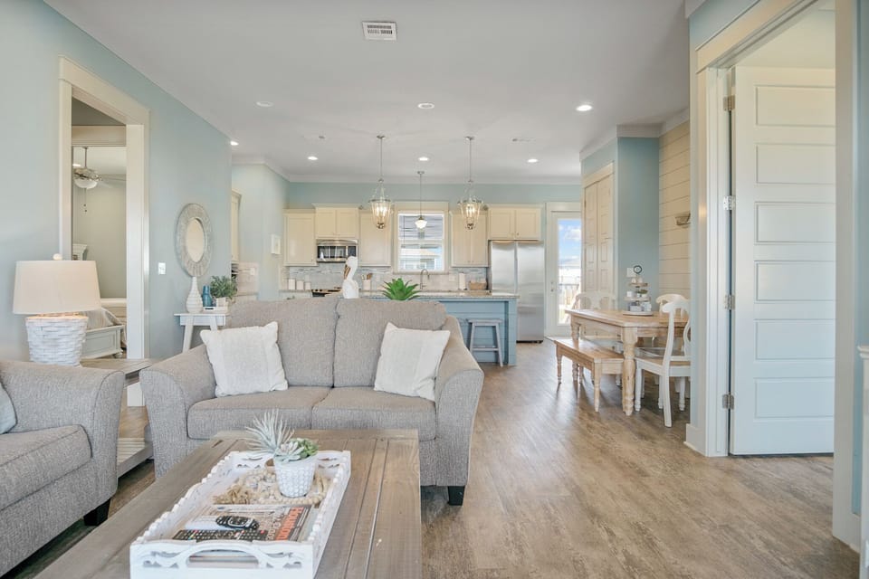 Comfortable couches, natural light, and a warm, welcoming vibe.