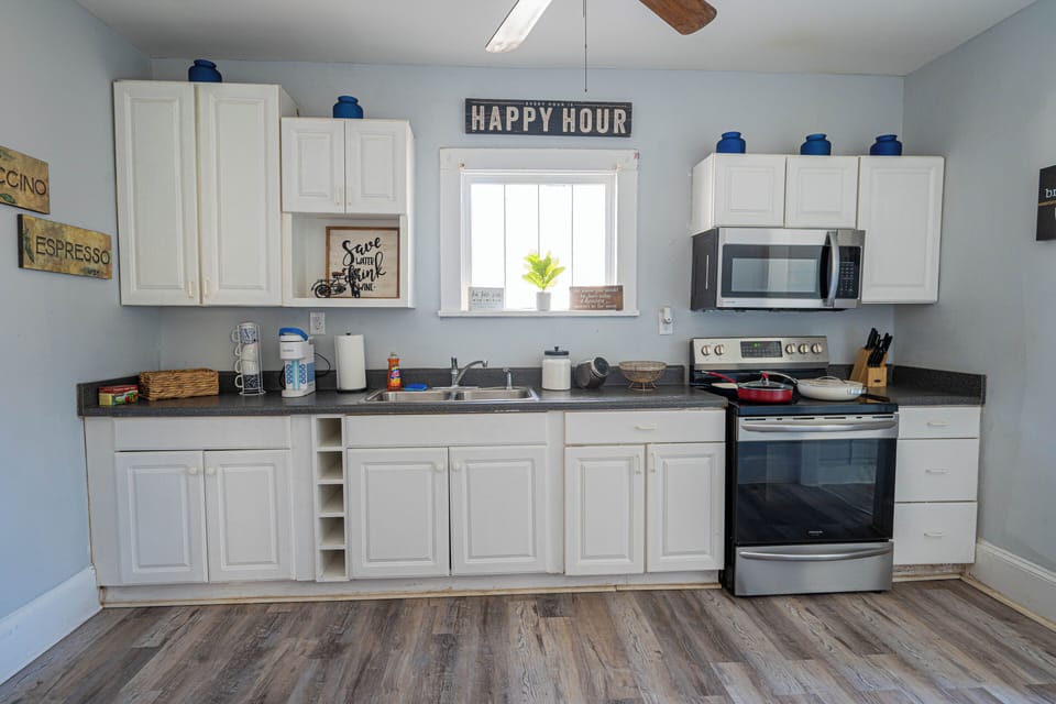 Fully equipped for your inner chef! From morning coffee to midnight snacks, this modern kitchen features all the essentials 