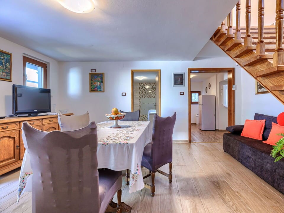 Furniture, Wood, Interior Design, Flooring, Kitchen, Cabinetry, Floor, Room, Major Appliance, Cupboard