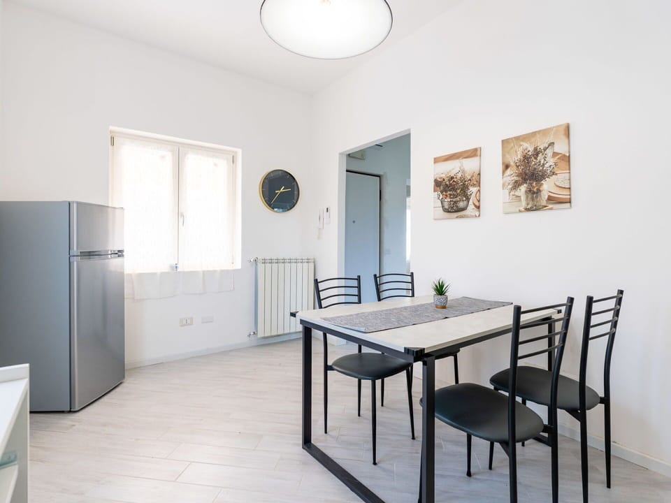 Furniture, Wood, Interior Design, Flooring, Kitchen, Cabinetry, Floor, Room, Major Appliance, Cupboard