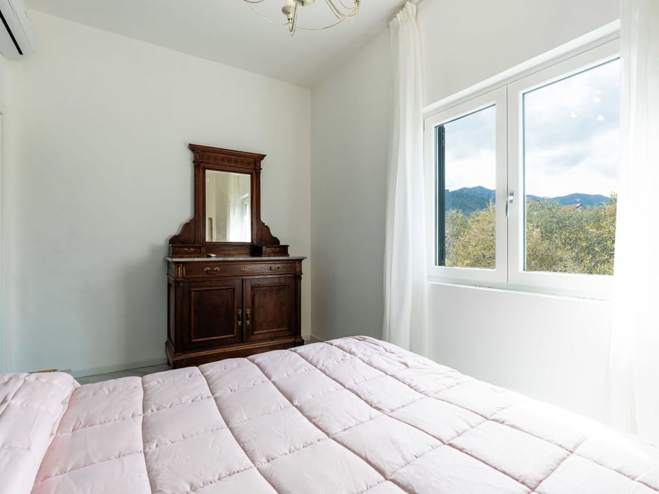 Furniture, Wood, Interior Design, Flooring, Kitchen, Cabinetry, Floor, Room, Major Appliance, Cupboard