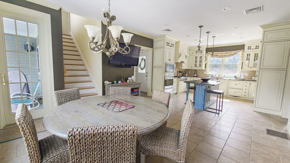 Dine-in kitchen with high-end appliances