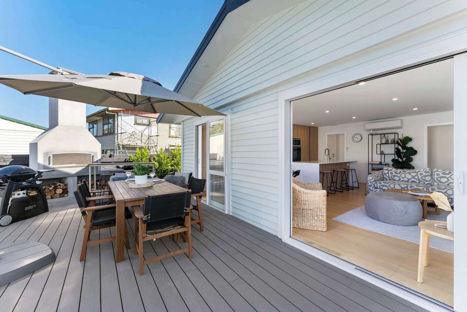 Spacious deck with outdoor fireplace
