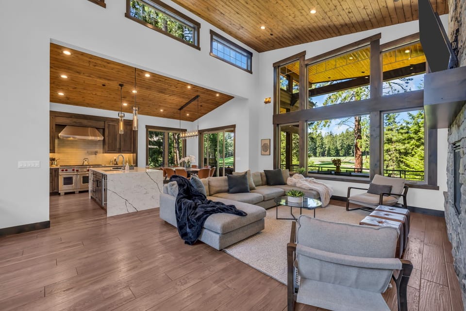 Living Area – Oversized Windows + Elegant Rustic Finishes + Open-Flow Layout