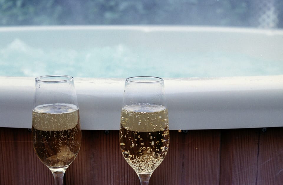 Enjoy a glass of bubbly in the hot tub! 