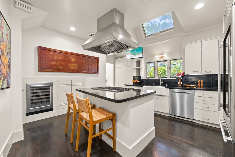Sleek, modern kitchen with high-end stainless steel appliances and ample counter space for preparing delicious meals